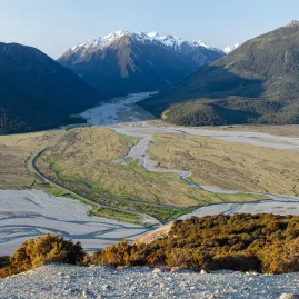 Panoramic view of the Waimakariri Valley with braided rivers and snow-capped peaks