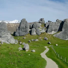 Limestone boulders and green fields at Castle Hill in Canterbury, New Zealand