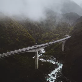 The Otira Viaduct stretching across a misty mountain valley in Arthur’s Pass