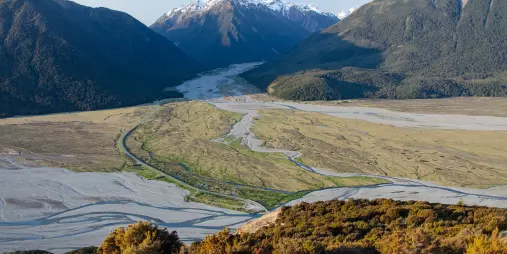 Panoramic view of the Waimakariri Valley with braided rivers and snow-capped peaks