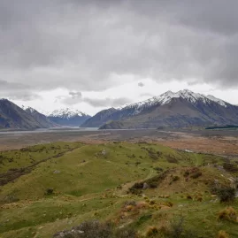 Panoramic view across Rangitata Valley towards Mount Sunday and snow-capped peaks