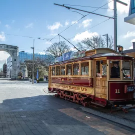 Christchurch Tram passing the Bridge of Remembrance in the city centre