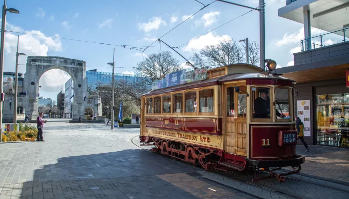 Christchurch Tram passing the Bridge of Remembrance in the city centre