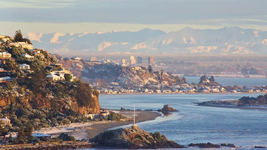 View of Sumner and Christchurch with the Southern Alps in the background
