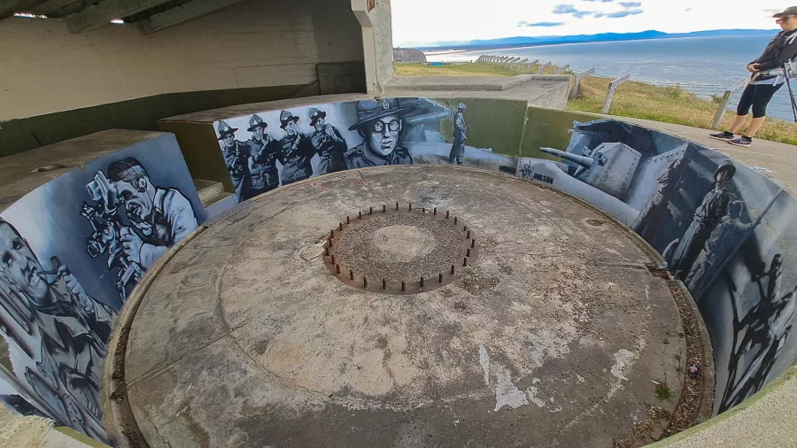 Detailed mural of New Zealand soldiers inside Godley Head’s coastal defence battery