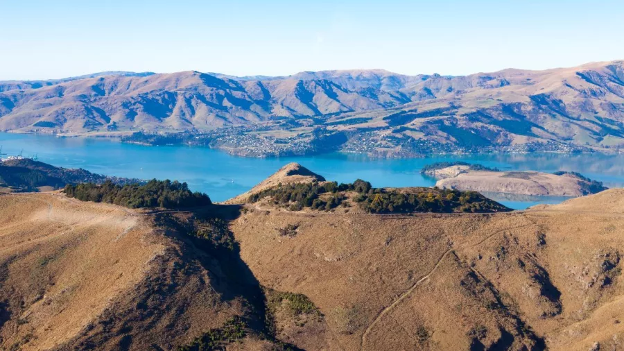 Aerial view of Lyttelton Harbour and surrounding mountains on route to Akaroa