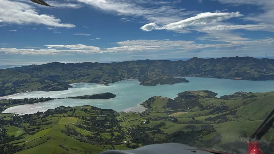 Aerial view of Diamond Harbour looking across to Lyttelton Harbour on a scenic helicopter flight