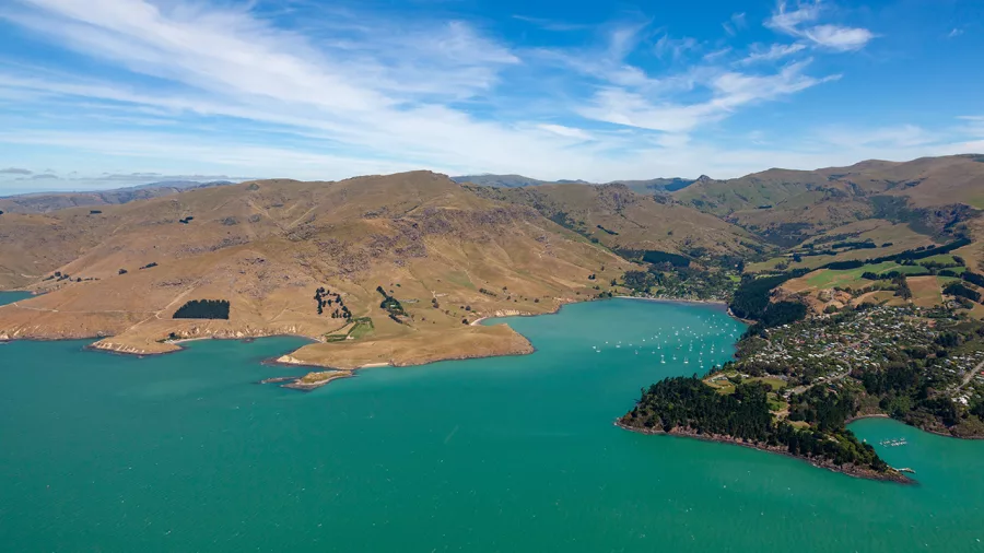 Helicopter view of Diamond Harbour and Lyttelton in Banks Peninsula