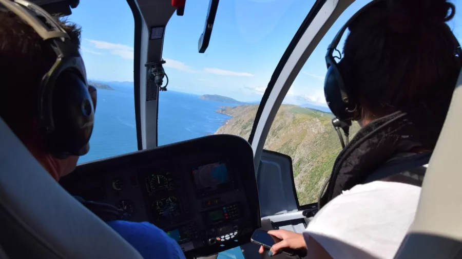 Aerial view of Christchurch coastline from helicopter cockpit