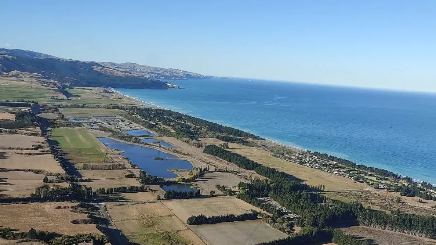 Aerial view of Pegasus Bay coastline on the Kaikōura helicopter tour