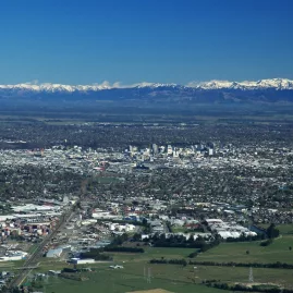 Aerial view of Christchurch city with the Canterbury Plains and Southern Alps in the background
