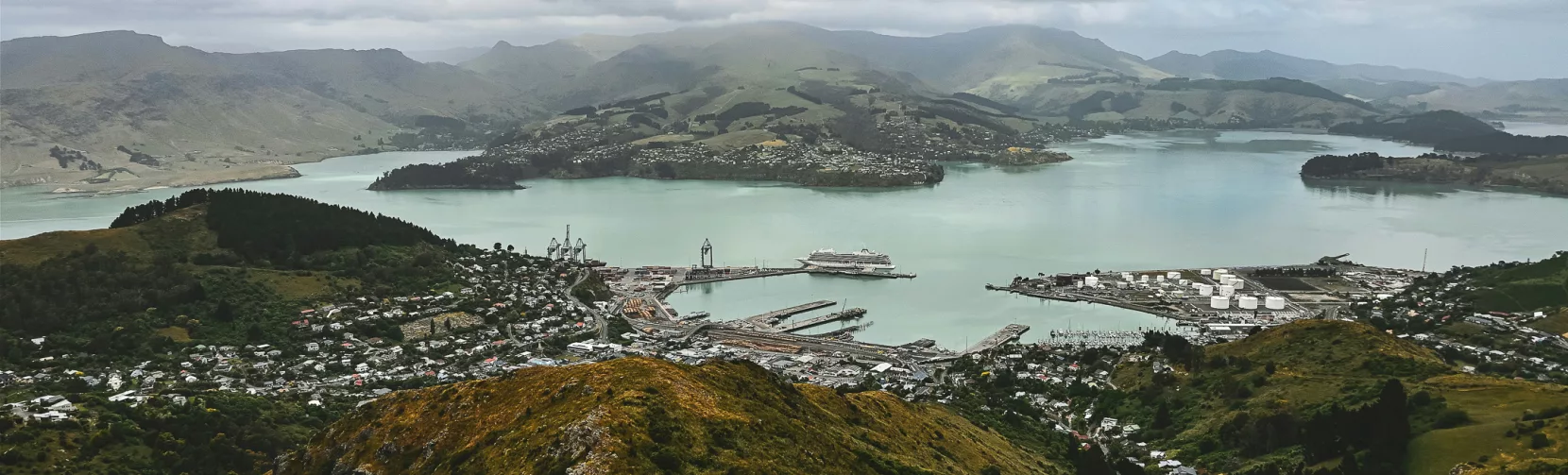 Aerial view of Lyttelton Harbour and surrounding hills in Christchurch