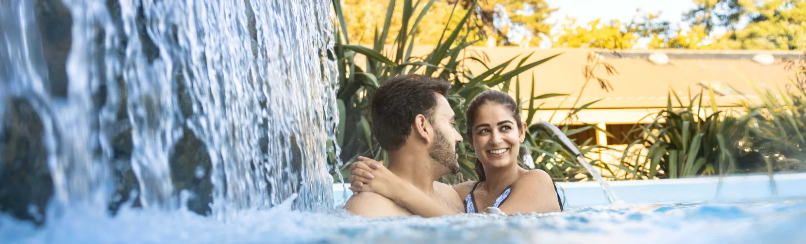 Couple relaxing in AquaTherapy pools at Hanmer Springs Thermal Pools and Spa