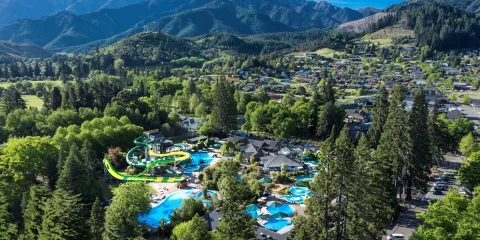 Aerial view of Hanmer Springs Thermal Pools and Spa with surrounding mountains