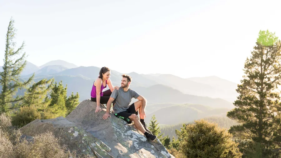 Couple hiking to Conical Hill lookout in Hanmer Springs