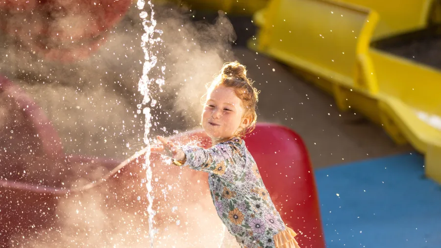 Child playing in water playground at Hanmer Springs Thermal Pools and Spa
