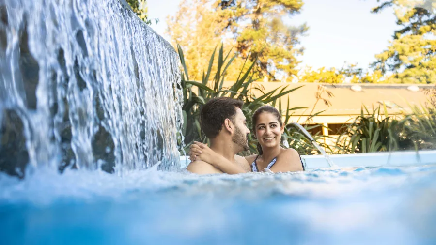 Couple relaxing in AquaTherapy pools at Hanmer Springs Thermal Pools and Spa