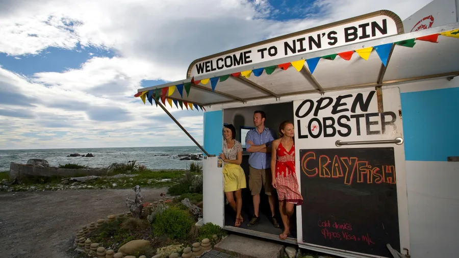 Visitors at Nin’s Bin crayfish caravan in Kaikōura