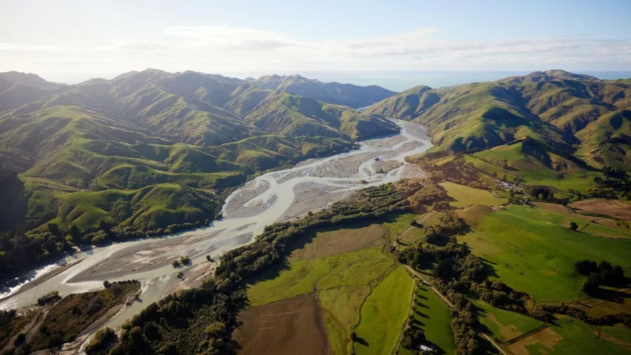 Aerial view of the Clarence River winding through lush hills on the Grand Alpine Tour from Kaikōura