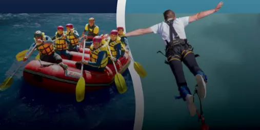 Double Dare Combo - Rafters paddling under blue sky alongside bungy jumper over river canyon