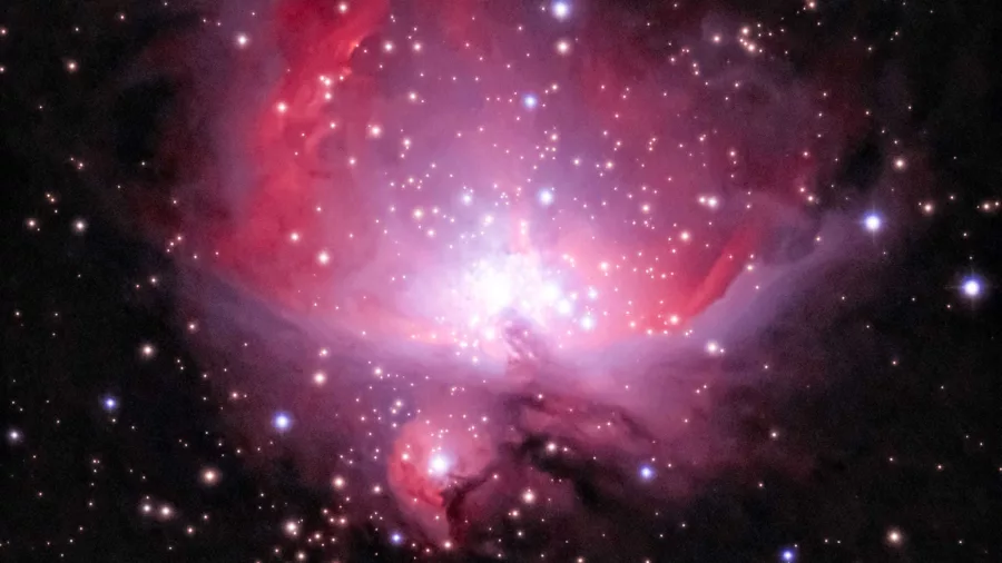 Bright Orion Nebula glowing in night sky through telescope on Hanmer Springs stargazing tour