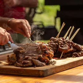 Locally sourced gourmet meat being served fresh at Matai Peak outdoor barbecue