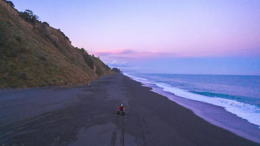 4x4 quad bike adventure along the remote Kaikōura beach at sunset