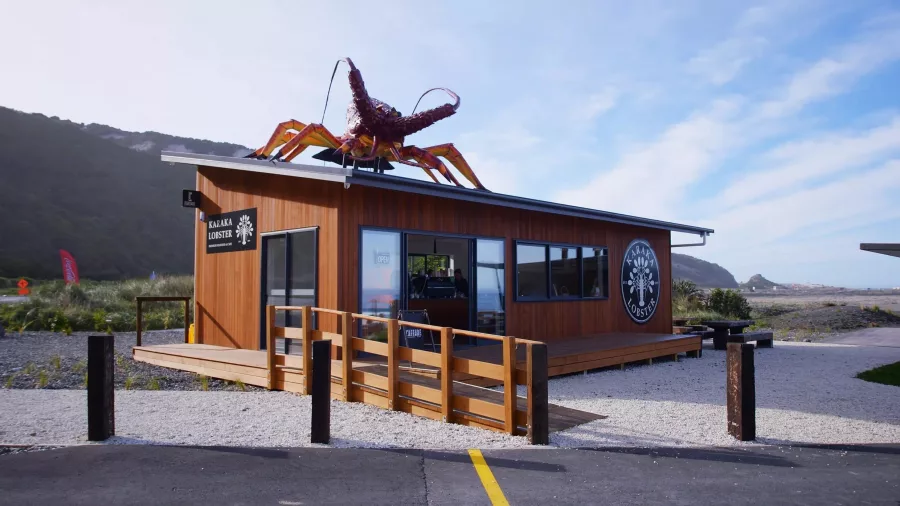 Karaka Lobster café with large crayfish sculpture near Kaikōura coast