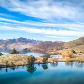 Aerial view of Lake Benmore with turquoise waters and scenic landscape