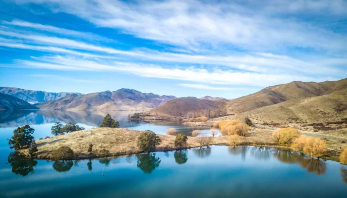 Aerial view of Lake Benmore with turquoise waters and scenic landscape