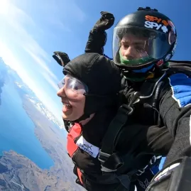Tandem skydive in freefall with Lake Tekapo and Southern Alps in the background