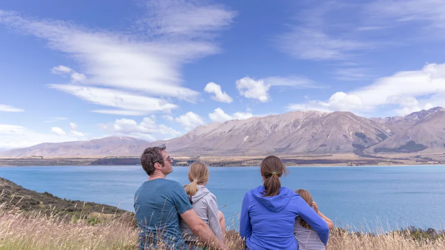 Family enjoying the view from Ben Ohau Summit Track near Twizel