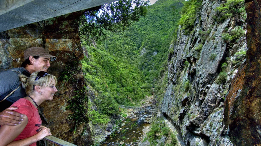 Couple at Windows Walk lookout in Karangahake Gorge