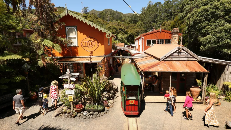 Visitors boarding the Driving Creek Railway train at the main station