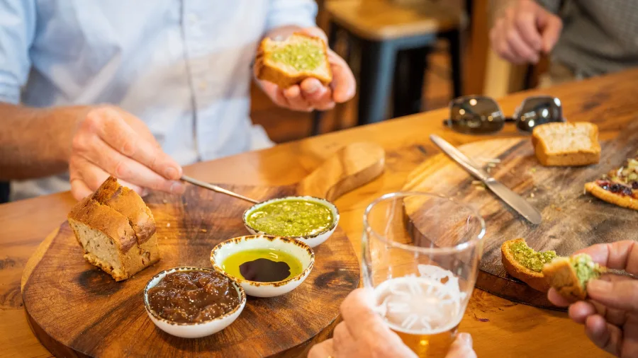 Tasting platter with dips, bread and local craft beer at Sunshine Brewery Tap Room Gisborne