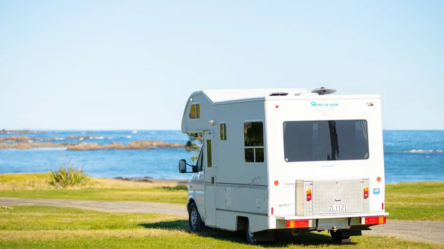 RV parked beside the sea along SH35, East Cape, New Zealand