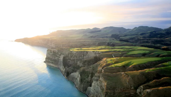 Cape Kidnappers golf course at sunset with cliffs and coastline in Hawke’s Bay