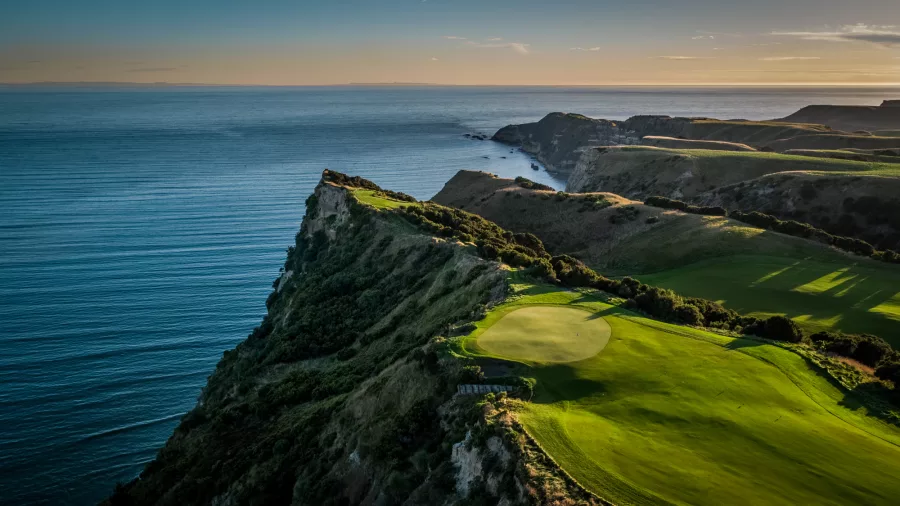 Clifftop green at Cape Kidnappers golf course overlooking the ocean near Napier