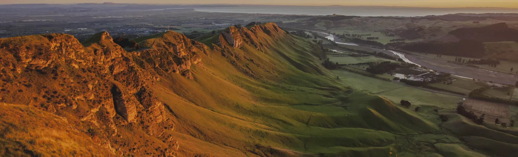 Te Mata Peak at sunrise overlooking Havelock North and Hastings in Hawke’s Bay