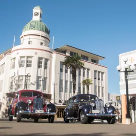 Vintage cars outside an Art Deco Centre building in central Napier, Hawke’s Bay