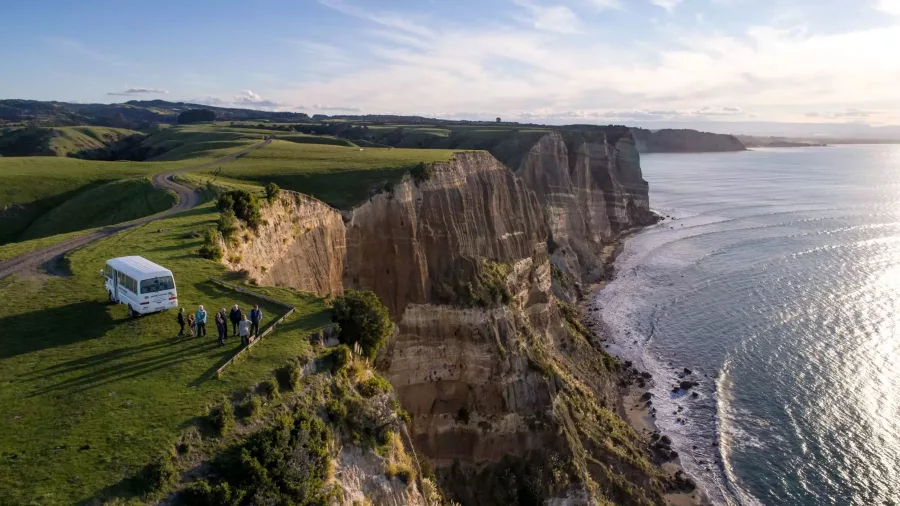 Aerial view of Gannet Safaris tour group on cliffs above Cape Kidnappers’ rugged coastline