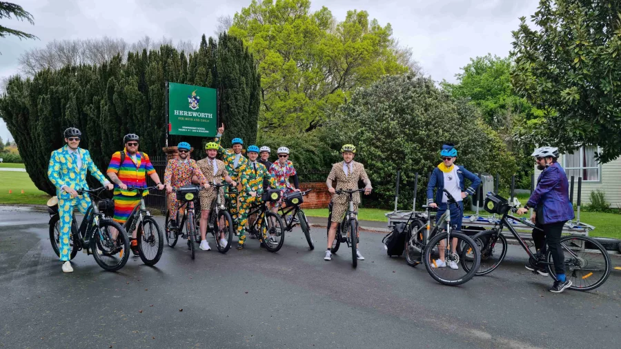 Group of cyclists in colourful fancy dress posing on the Hawke’s Bay Cycle Trails