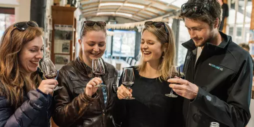 Guests enjoying a guided wine tasting at a Hawke’s Bay cellar door