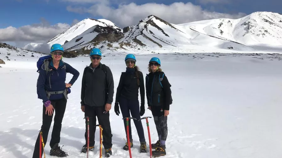 Group of hikers in winter gear on a guided Tongariro Alpine Crossing walk