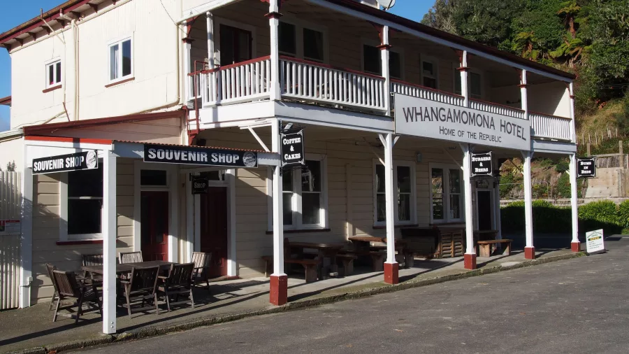 Front view of the historic Whangamōmona Hotel on a sunny day in the Republic of Whangamōmona.