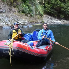Two anglers in a raft during a multi-day fishing trip on the Rangitikei River