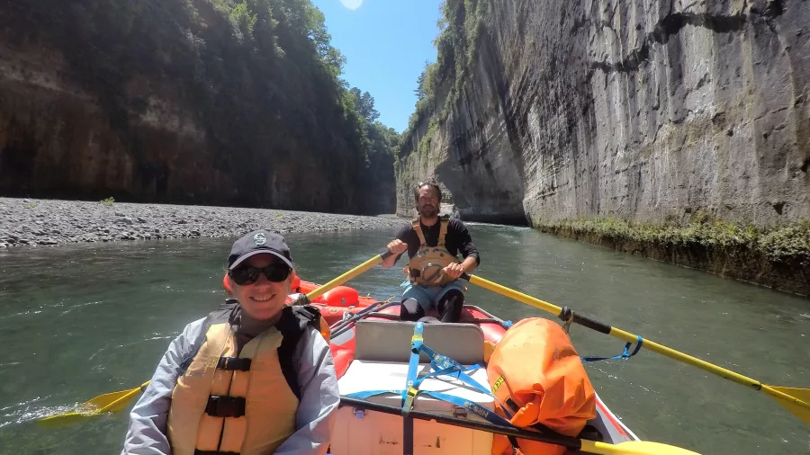 Smiling rafter enjoying a multi-day rafting adventure on the Rangitikei River