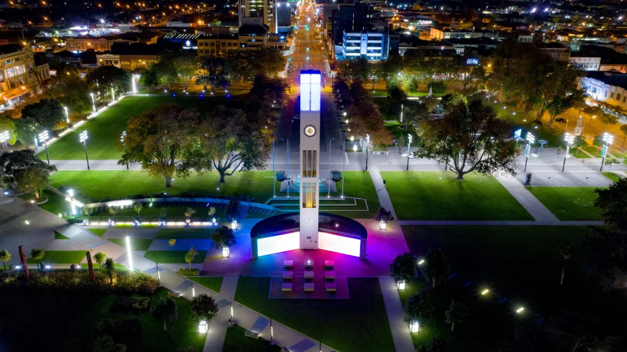 Colourful night view of The Square Clock Tower in Palmerston North