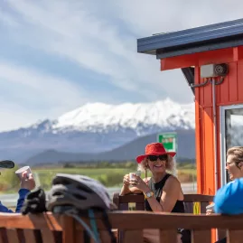 People enjoying coffee with view of Mt Ruapehu in Waimarino