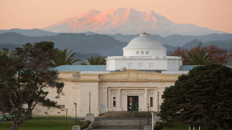 Sarjeant Gallery in Whanganui with Mount Ruapehu in the background at sunset